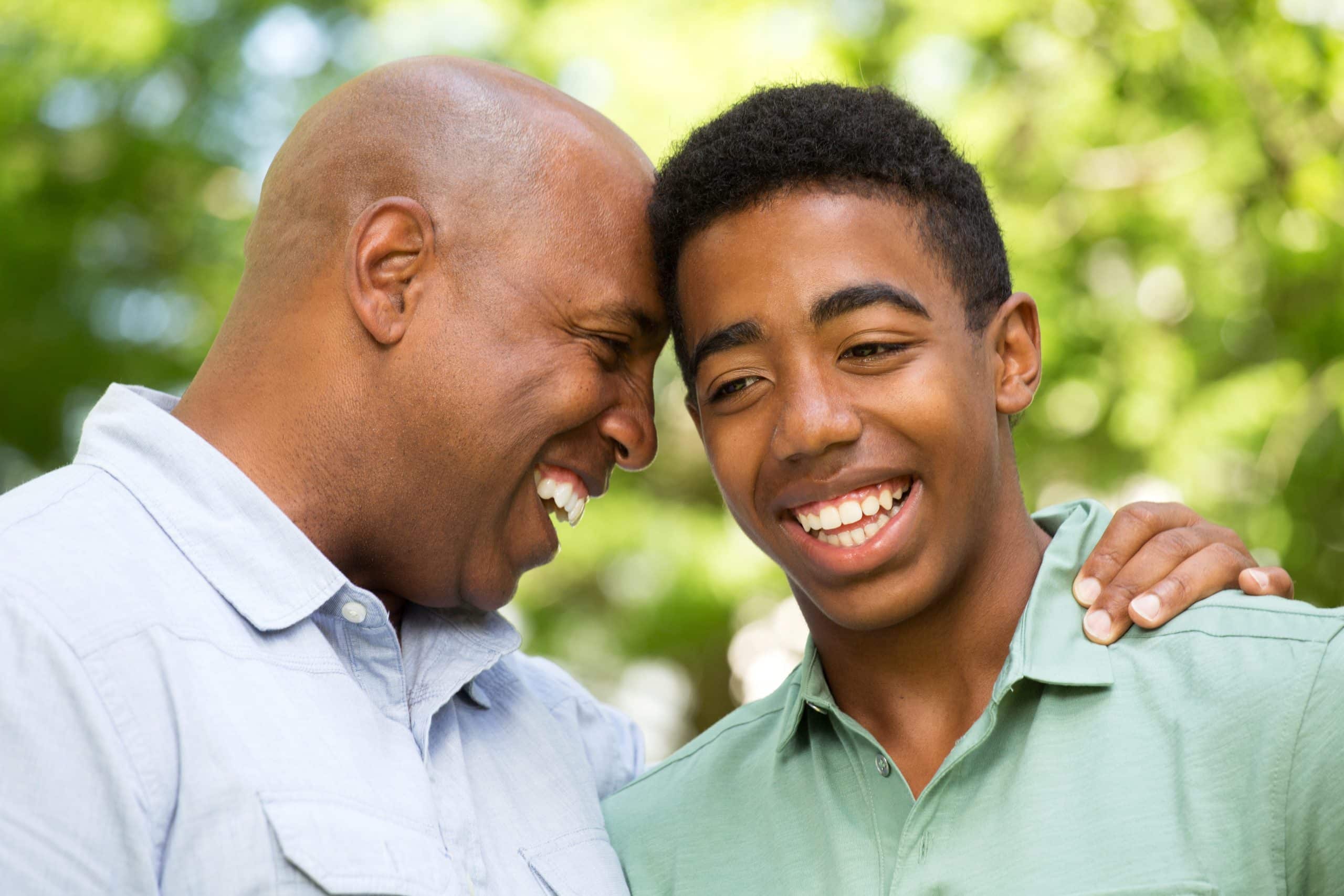 A foster parent spends time with a teen in foster care.